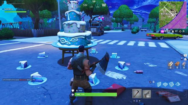 la prochaine etape est l emplacement du gateau d anniversaire retail row vous voulez aller a l emplacement et aller a la section est de la ville - gateau fortnite emplacement